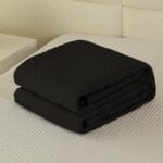 Narzuta na łóżko 200×220 cm czarna pikowana dwustronna MILA